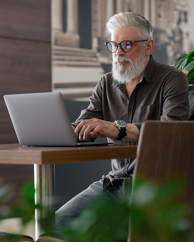 mature-man-laptop-cognitive-focus-mental-sharpness-nad